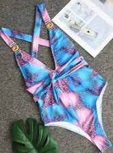 Traje de baño de una pieza con escote en V y estampado de leopardo y diamantes de cristal